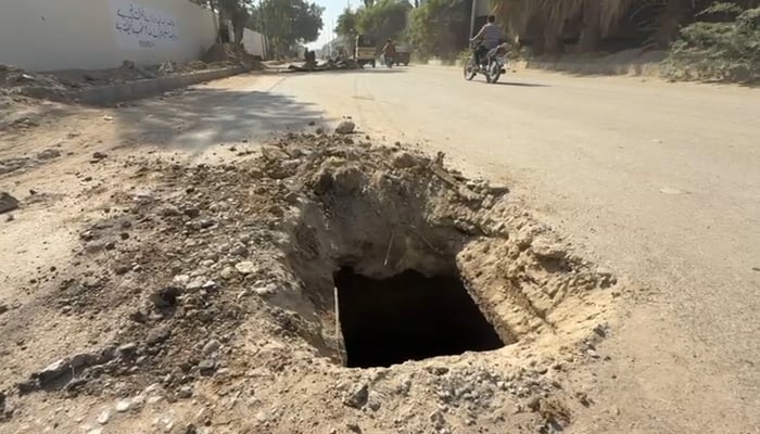 The manhole where three-year-old Ibrahim fell, on December 1, 2025. — Geo News