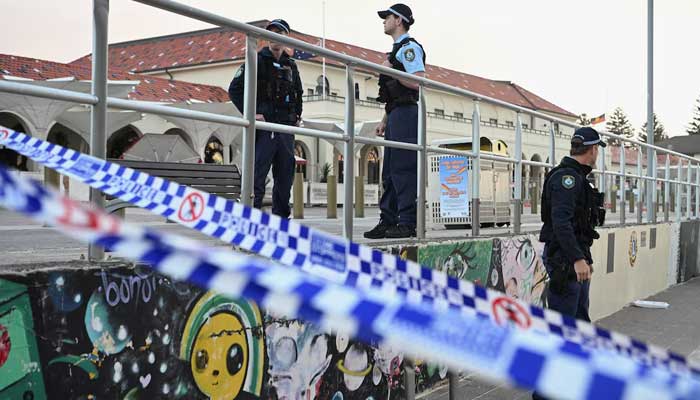 Police officers stand guard following the attack on a Jewish holiday celebration at Sydneys Bondi Beach, in Sydney, Australia on December 15, 2025. — Reuters