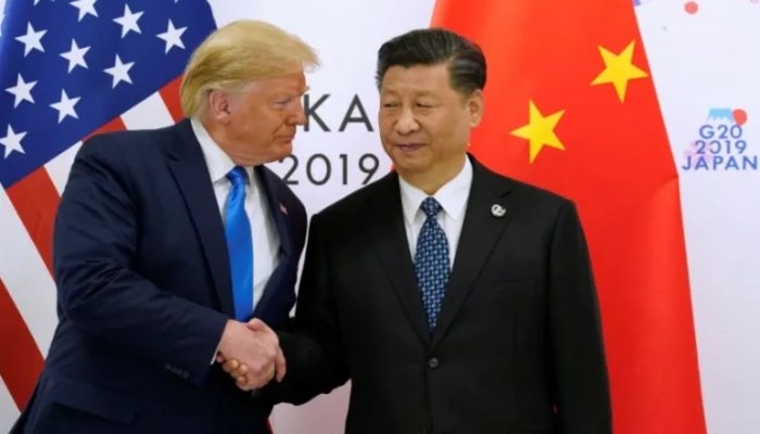 US President Donald Trump and Chinese President Xi Jinping greet each other at the G20 summit in Japan, 2019. — Reuters