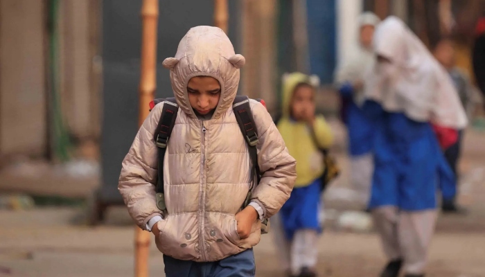 Representational image of a child walking to school on a cold winter morning in Karachi, on January 2, 2026. — Reuters