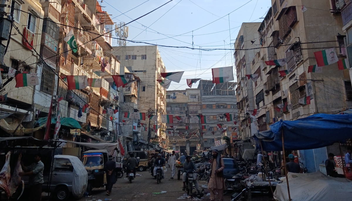 A street in Karachi is decorated with MQM flags ahead of general elections in Pakistan. — Instagram/@umersheikhphoto