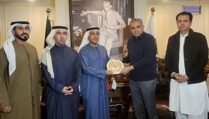 Federal Interior Minister Mohsin Naqvi (second right), Minister of State for Interior Talal Chaudhry (first right) pose for a picture with UAE officials on January 13, 2026. — Reporter