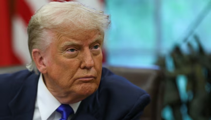 US President Donald Trump looks on as he signs executive orders and proclamations in the Oval Office at the White House, in Washington, DC on May 5, 2025. — Reuters