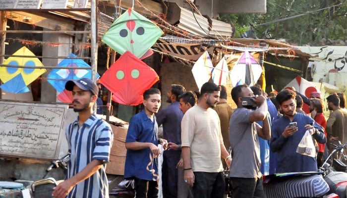 This representational image shows a view of rush of people buying kites and threads in Hyderabad. — PPI/File