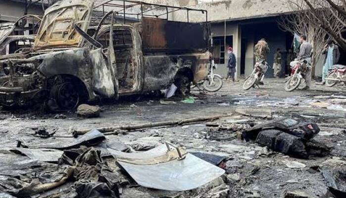 People walk amid damages at a police station, following militant attacks, in Quetta, Balochistan, February 1, 2026. — Reuters