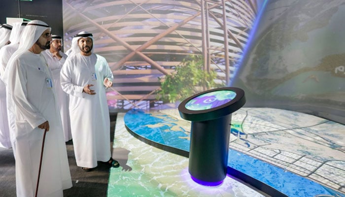 Dubai ruler Sheikh Mohammed bin Rashid Al Maktoum is being given briefing on Water and Green Space Roadmap 2030 in this undated image. — Reporter
