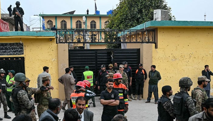 Security personnel stand guard outside a mosque following an explosion, in Islamabad on February 6, 2026. — AFP