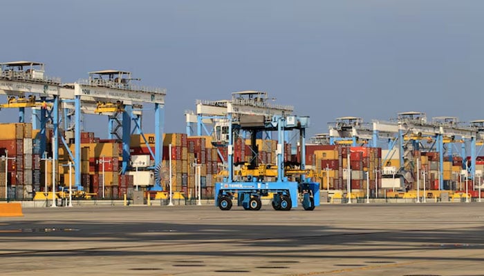 Containers are seen at Abu Dhabis Khalifa Port after it was expanded in Abu Dhabi, UAE, December 11, 2019. — Reuters