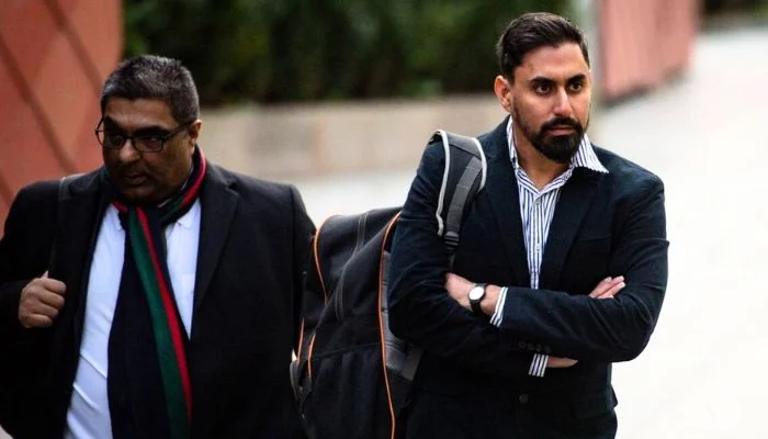 Former Pakistan batter Nasir Jamshed (left) with his solicitor. — Reporter