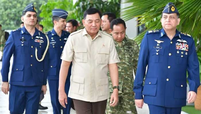 Pakistan Air Force Chief of Air Staff Air Chief Marshal Zaheer Ahmed Baber Sidhu (right) walks with Indonesian President Prabowo Subianto (centre) ahead of a meeting during his visit to Indonesia. — ISPR
