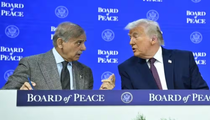Prime Minister Shehbaz Sharif speaks with US President Donald Trump at the Board of Peace meeting during the World Economic Forum (WEF) annual meeting in Davos. — AFP