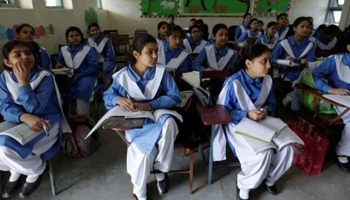 This undated photo shows students are listening to their teacher during a lesson at their school. — Reuters