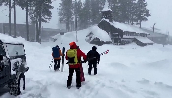 Rescue teams head to the site where skiers were trapped by an avalanche in the snow-covered Sierra Nevada mountains near Nevada City, California, US, February 19, 2026. — Reuters