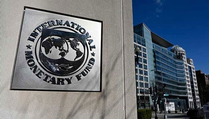 Image shows the seal for the International Monetary Fund (IMF) in Washington, DC on  January 26, 2022. — AFP