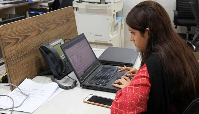 An employee works on a computer at the office of Pakistan Freelancers Association (PAFLA), a platform and support group to help freelancers, in Karachi, Pakistan August 22, 2024.— Reuters/File