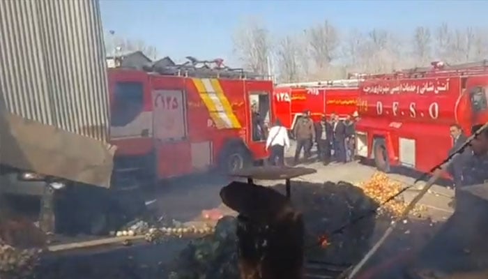 Rescue agencies work at the scene after an Iranian Army helicopter crashed into a fruit and vegetable market in the city of Dorcheh, Isfahan province, Iran on February 24, 2026. — X@MehrnewsCom