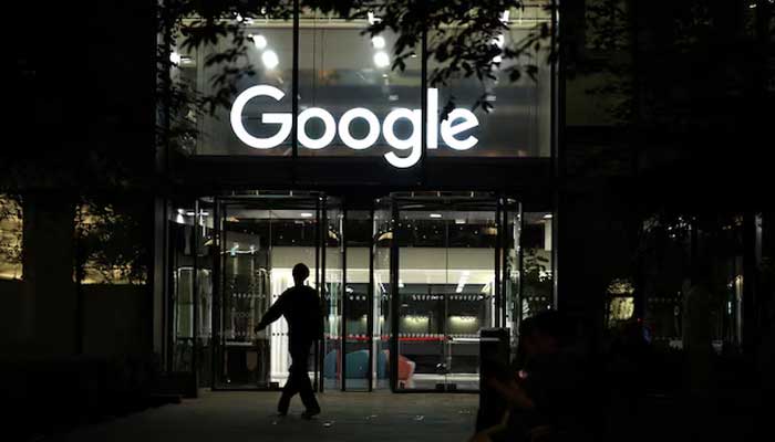 A pedestrian walks past the Google offices in London, Britain, August 14, 2025. — Reuters