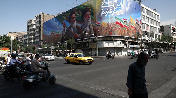 US, Iran exchange attacks for second day after Trump threatens escalation