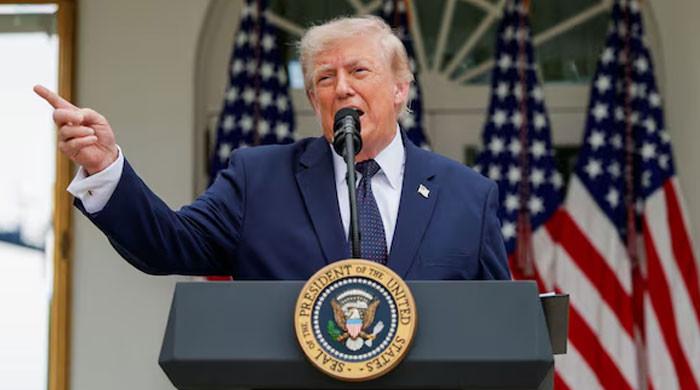 Trump says US hit Iran 'very hard' in latest strikes, Hormuz 'open' to commercial traffic