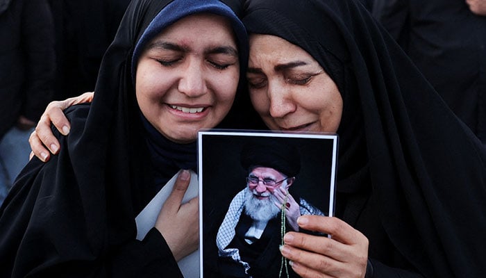 People react as they gather at the Enghelab Square, after Irans Supreme Leader Ayatollah Ali Khamenei was martyred in Israeli and US strikes in Tehran, Iran on March 1, 2026. — Reuters