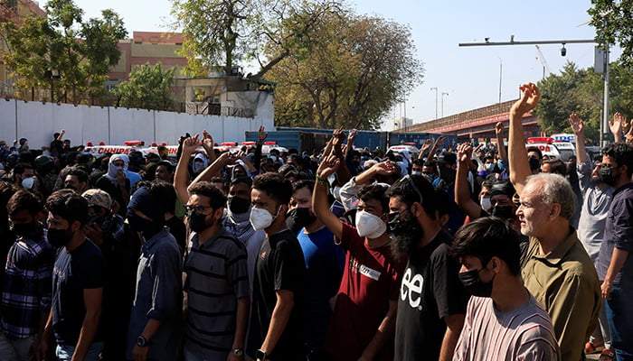 People chant slogans during a protest outside the US and Israeli strikes on Iran that killed Irans Supreme Leader Ayatollah Ali Khamenei, in Karachi, Pakistan, March 1, 2026. — Reuters