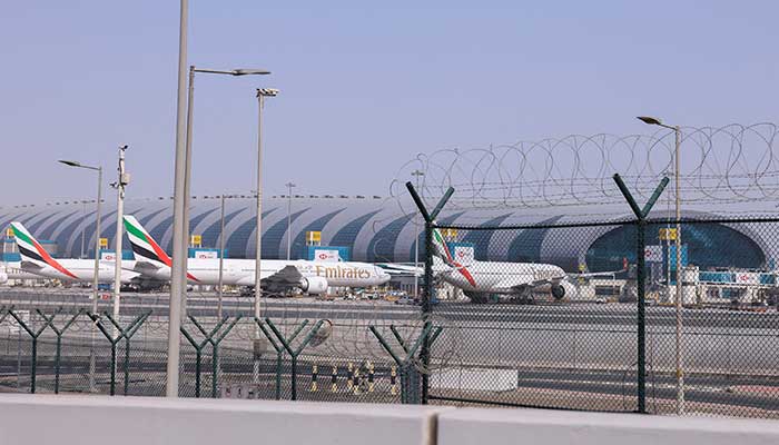 Planes are parked at Terminal 3 of the Dubai International Airport, following the United States and Israel strikes on Iran, in Dubai, United Arab Emirates, March 2, 2026. — Reuters