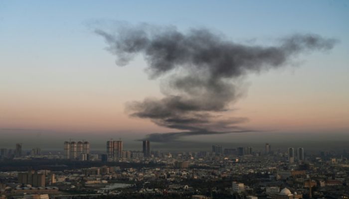 AFP photographer captures smoke rising near Erbil International Airport after an explosion on March 1, 2026. — AFP
