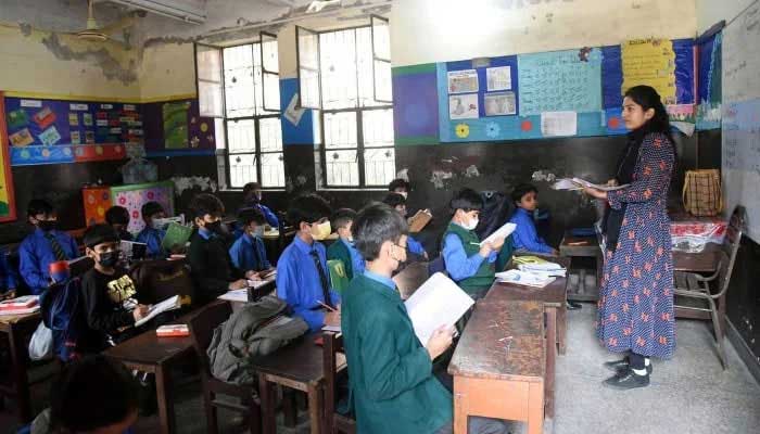 A teacher delivers a lesson during a class at a school on November 20, 2024. — APP