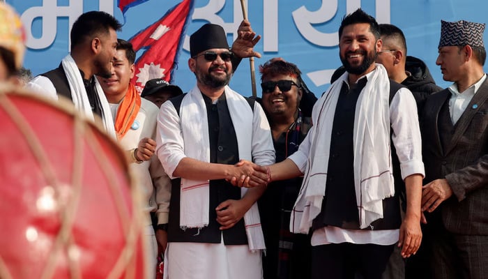 Balendra Shah, former mayor of Kathmandu popularly known as Balen, who according to party officials, will become prime minister under an internal agreement if the Rastriya Swatantra Party (RSP) wins the March 5 elections, shakes hand with Rabi Lamichhane, president of Rastriya Swatantra Party (RSP) during an election campaign in Janakpur, Nepal, January 19, 2026. — Reuters