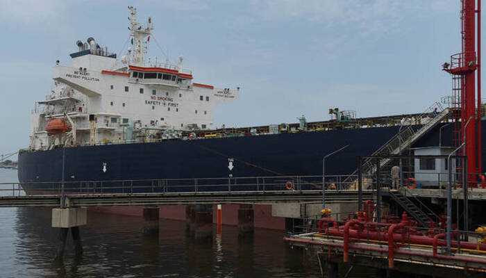 A cargo ship carrying crude oil docked at the Karachi port in Karachi on June 28, 2023. — AFP