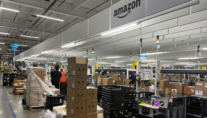 Boxes of products are seen waiting to be unpacked at an Amazon warehouse, which opened in August 2021, in Dartford, Kent, Britain. — Reuters/File