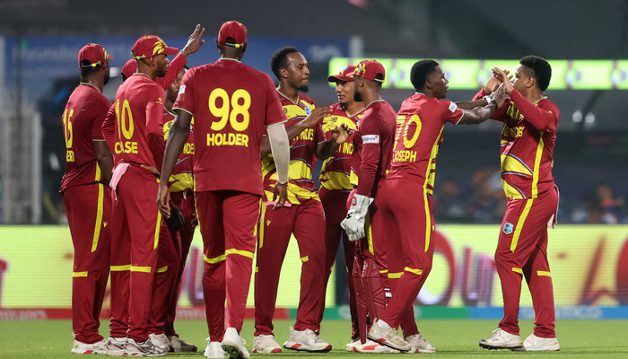 West Indies Sherfane Rutherford celebrates with teammates after catching out Indias Suryakumar Yadav off the bowling of West Indies Shamar Joseph during ICC T20 World Cup match on March 1, 2026. — Reuters