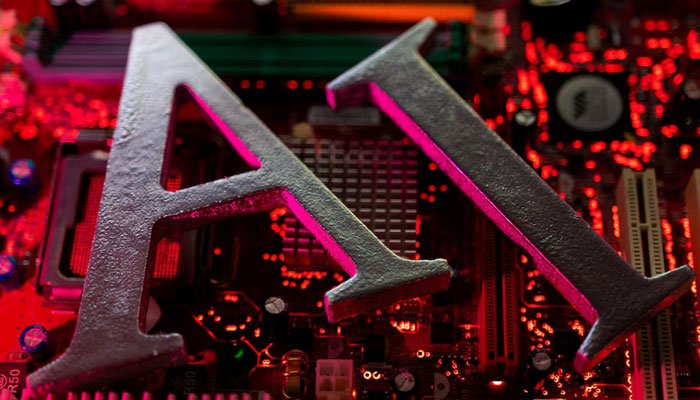 AI (Artificial Intelligence) letters are placed on computer motherboard in this illustration taken, June 23, 2023. — Reuters