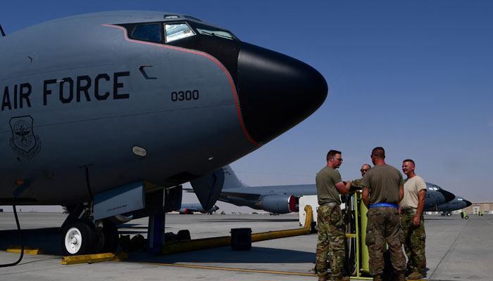 This representational image shows US Air Force Airmen from the 28th Expeditionary Air Refueling Squadron conduct a pre-flight brief outside of a KC-135 Stratotanker, before an aerial refueling mission in Al Udeid Air Base, Qatar, in this undated handout picture released by US Air Force on August 1, 2019. — Reuters