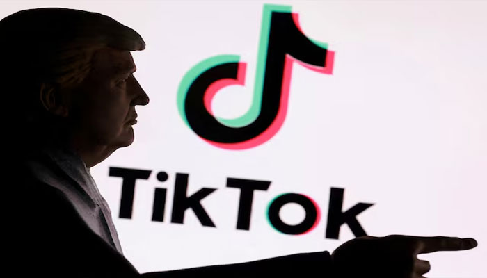 A 3D-printed miniature model depicting US President Donald Trump in front of TikTok logo is shown in this illustration taken September 24, 2025. — Reuters
