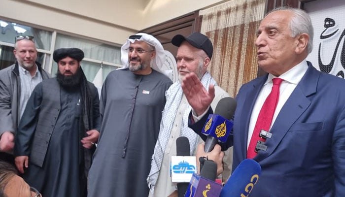 US former special envoy to Afghanistan Zalmay Khalilzad (right) flanked by Dennis Coyle (sedond right) talks to media in Kabul on March 24, 2026. — X/ @TOLONewsEnglish
