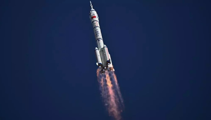 Long March-2F carrier rocket, carrying the Shenzhou-20 spacecraft and a crew of three astronauts, soars into the sky after take off from the Jiuquan Satellite Launch Centre in the Gobi desert. — AFP