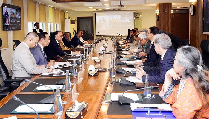 Federal Minister for Finance and Revenue Senator Muhammad Aurangzeb chairs a meeting of the Economic Coordination Committee at the Finance Division, Islamabad, on March 26, 2026. — PID