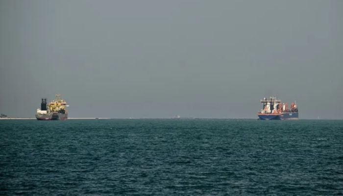 Commercial vessels shown offshore in Dubai. — AFP
