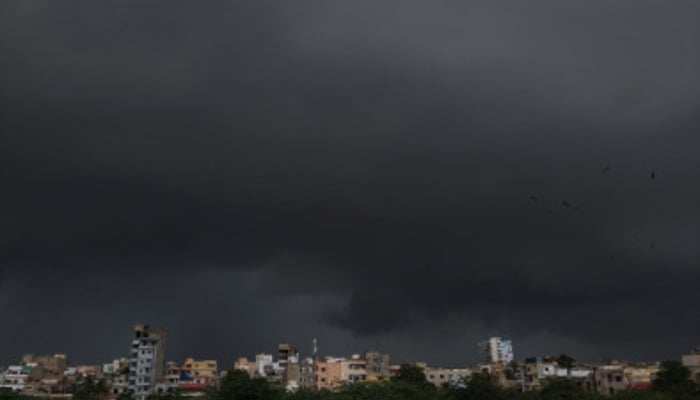 Dark cover of clouds on the skyline of Karachi ahead of rain is seen in this undated picture. — X@WajahatKazmi
