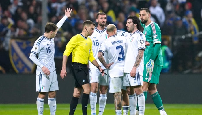 Italy players protest to referee Clement Turpin after Haris Tabaković scores Bosnia and Herzegovina’s first goal during a Fifa World Cup UEFA Qualifier at Bilino Polje Stadium in Zenica on March 31, 2026. — Reuters