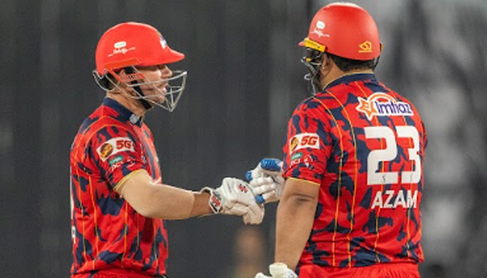Karachi Kings David Warner (left) and Azam Khan bump fists during their PSL 11 match against RawalPindiz at the Gaddafi Stadium in Lahore on April 2, 2026. — PSL