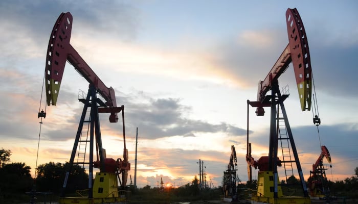 Pumpjacks are seen during sunset at the Daqing oil field in Heilongjiang province, China August 22, 2019. Picture taken August 22, 2019. — Reuters