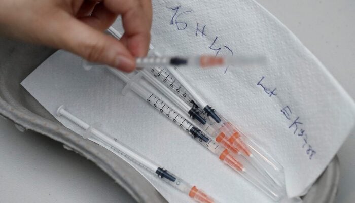 Syringes containing a dose of the Pfizer-BioNTech Covid-19 vaccine are seen at the Cent Quatre cultural centre in Paris, France, February 1, 2021. — Reuters
