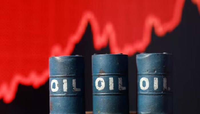 3D printed oil barrels, rising stock graph are seen in this illustration. — Reuters/File
