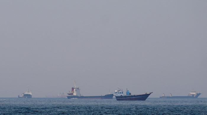 Oil prices dip, most stocks rise on lingering Iran peace hopes
