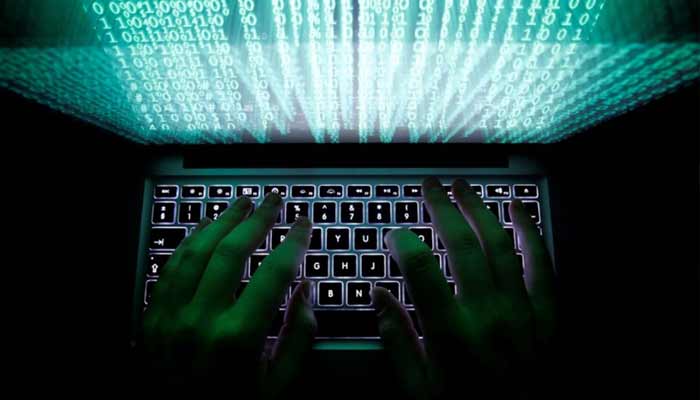 A man types on a computer keyboard in this illustration picture. — Reuters/File
