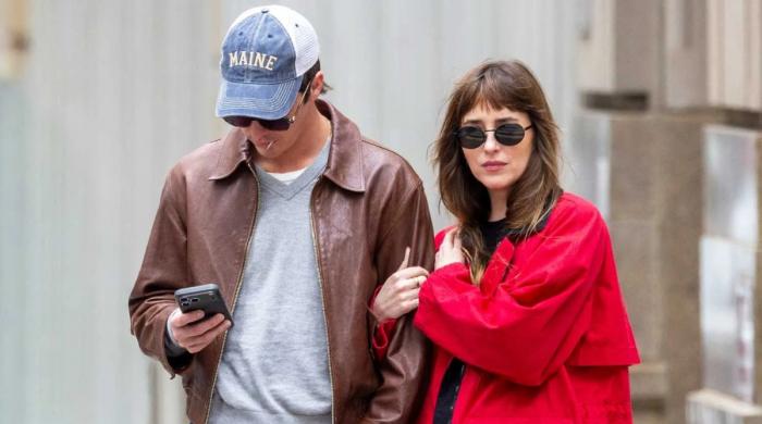 Dakota Johnson, Role Model go public with NYC stroll 