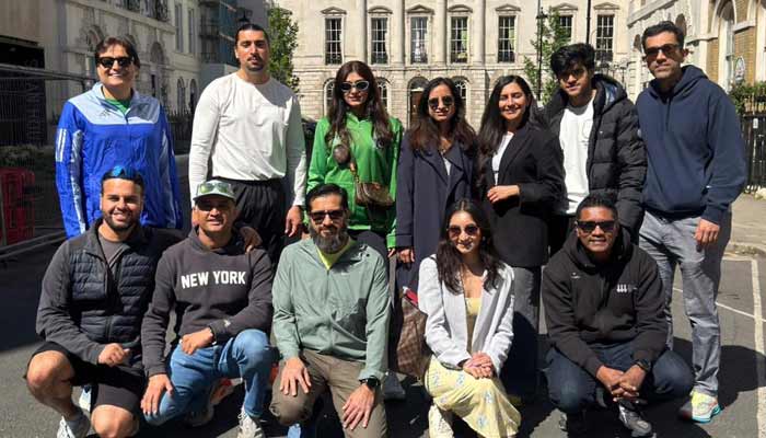 Pakistani runners pose for a group photo ahead of London Marathon 2026. — reporter