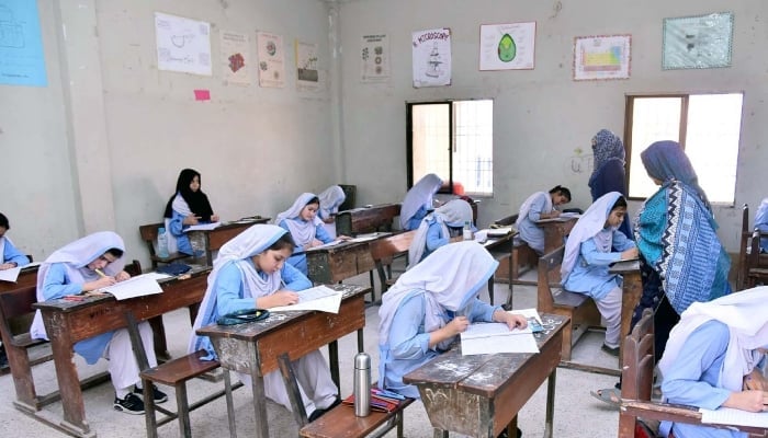 Students solving papers at an examination centre located in Karachi, April 16, 2025. — PPI